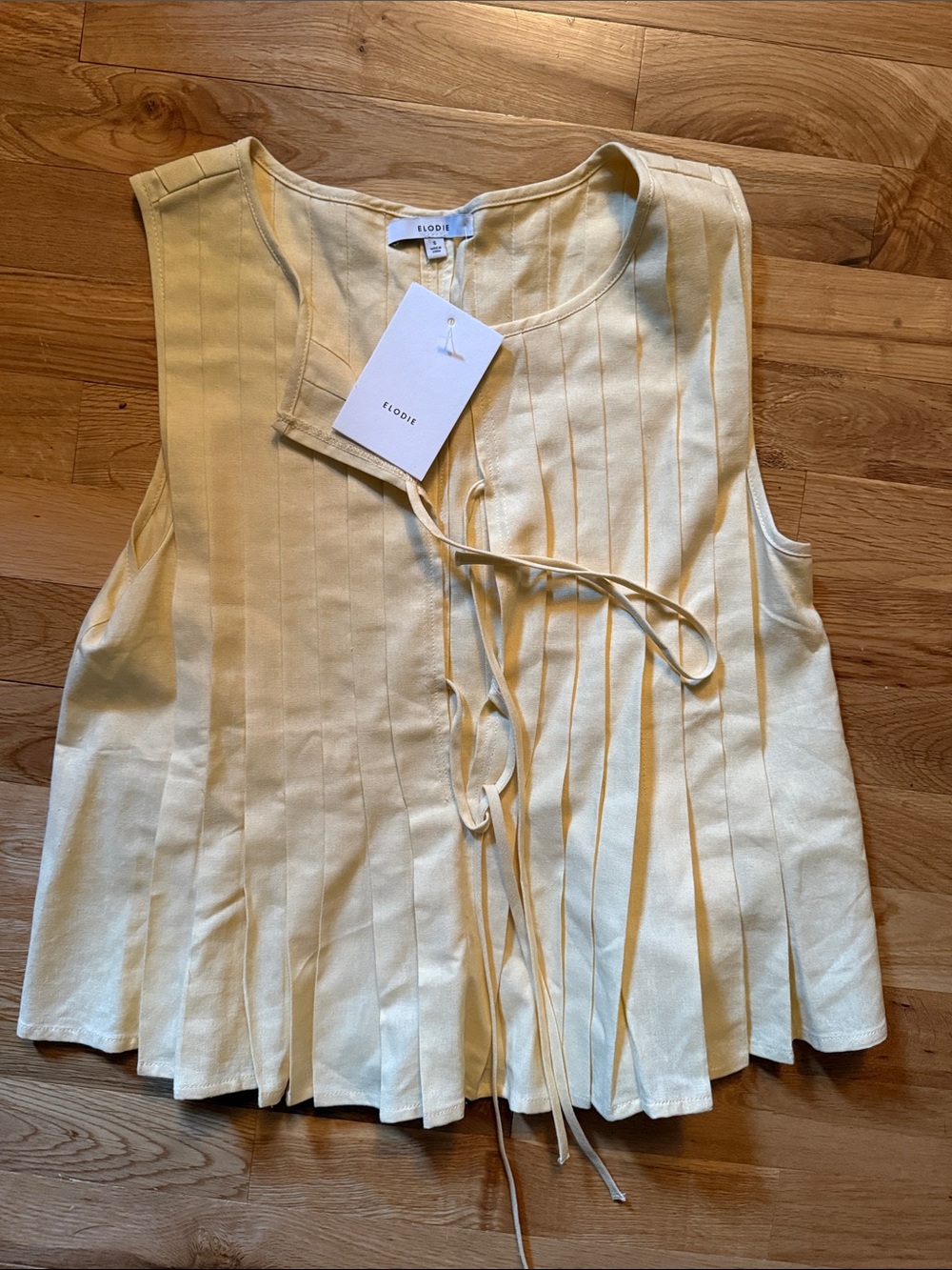 Elodie Light Cream Sleeveless Pleated Tie-Front Tank